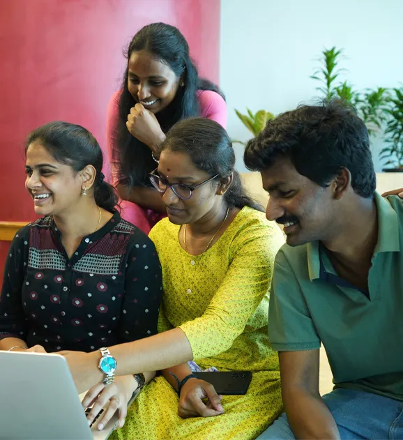 India office people looking at the computer