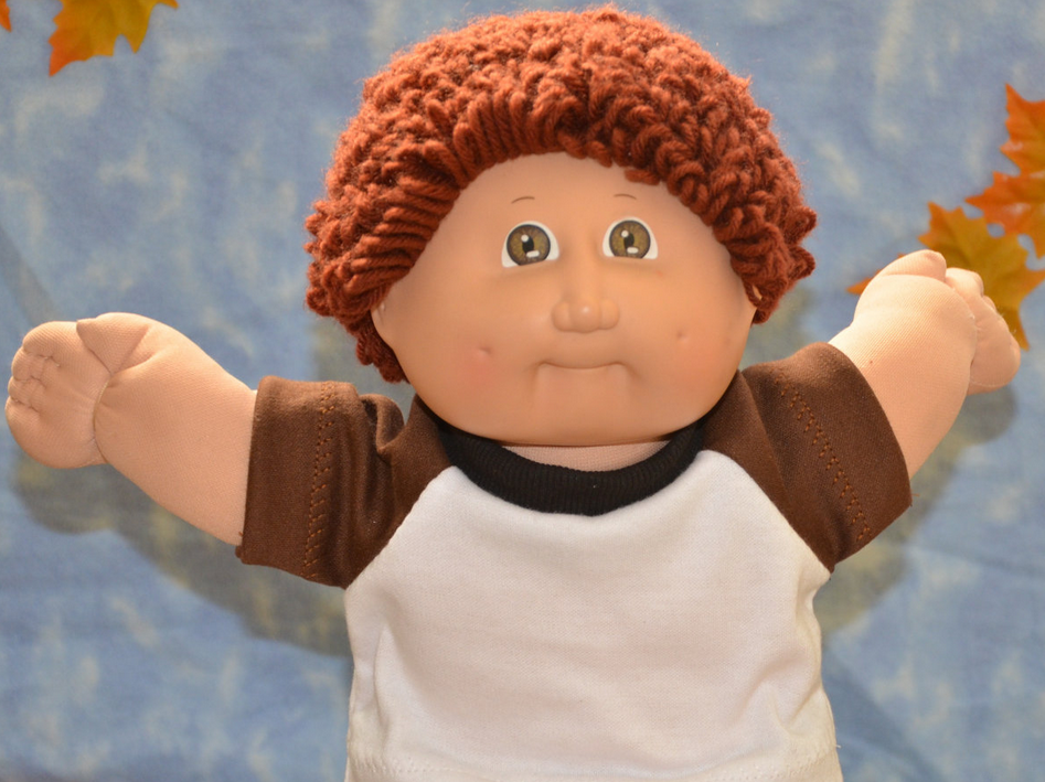 brown haired cabbage patch doll boy