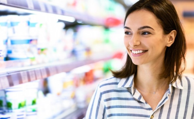 Closeup portrait of a woman shopping in a supermarket.