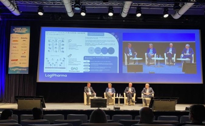 A panel of four presenters onstage at Logipharma Europe in front of a Logipharma branded background.