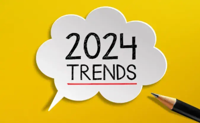 Text reading "2024 TRENDS" in a dialogue bubble on a bright yellow background